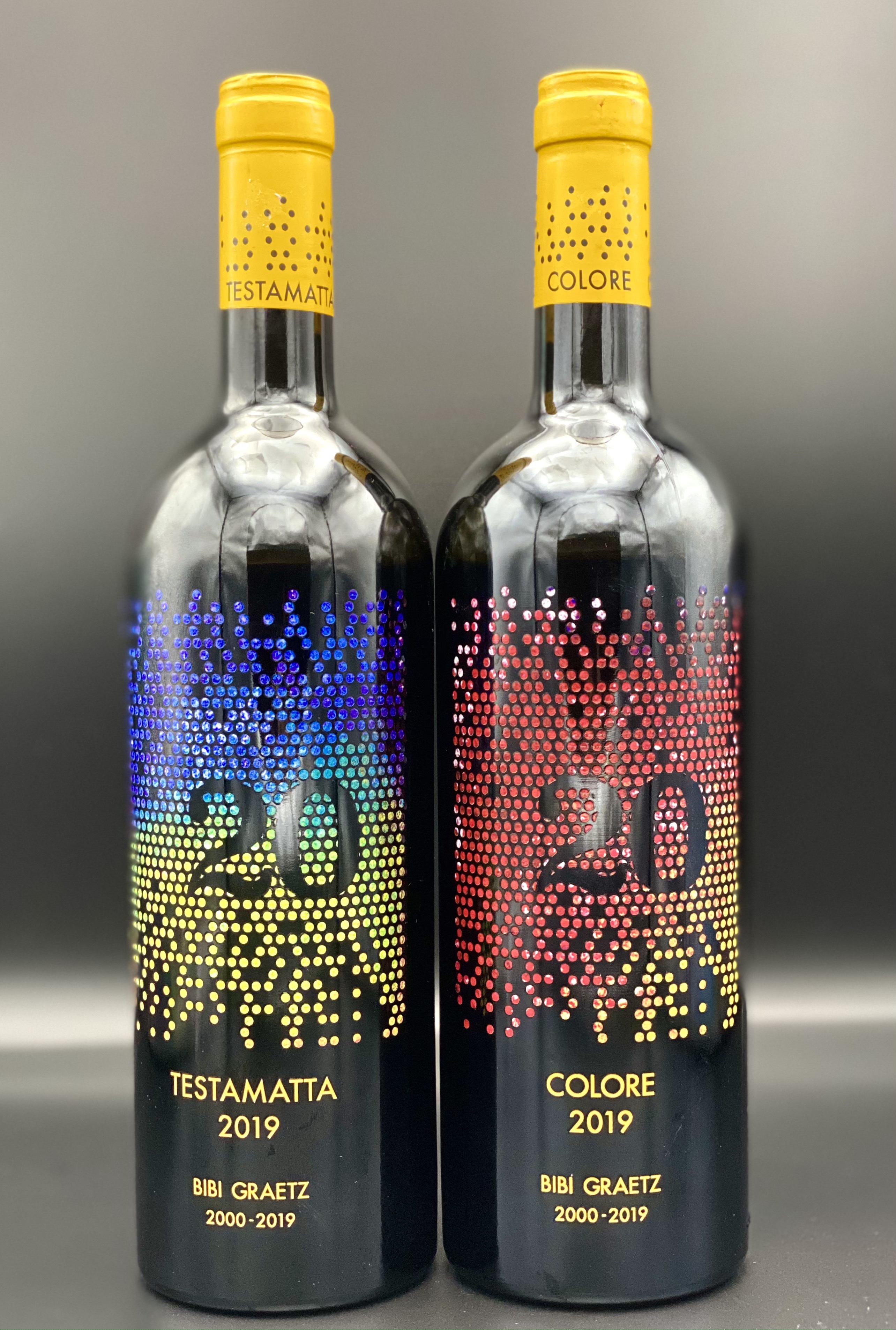 The unique bottle designs of Bibi Graetz's 20th anniversary vintages. (Photo by JamesSuckling.com)